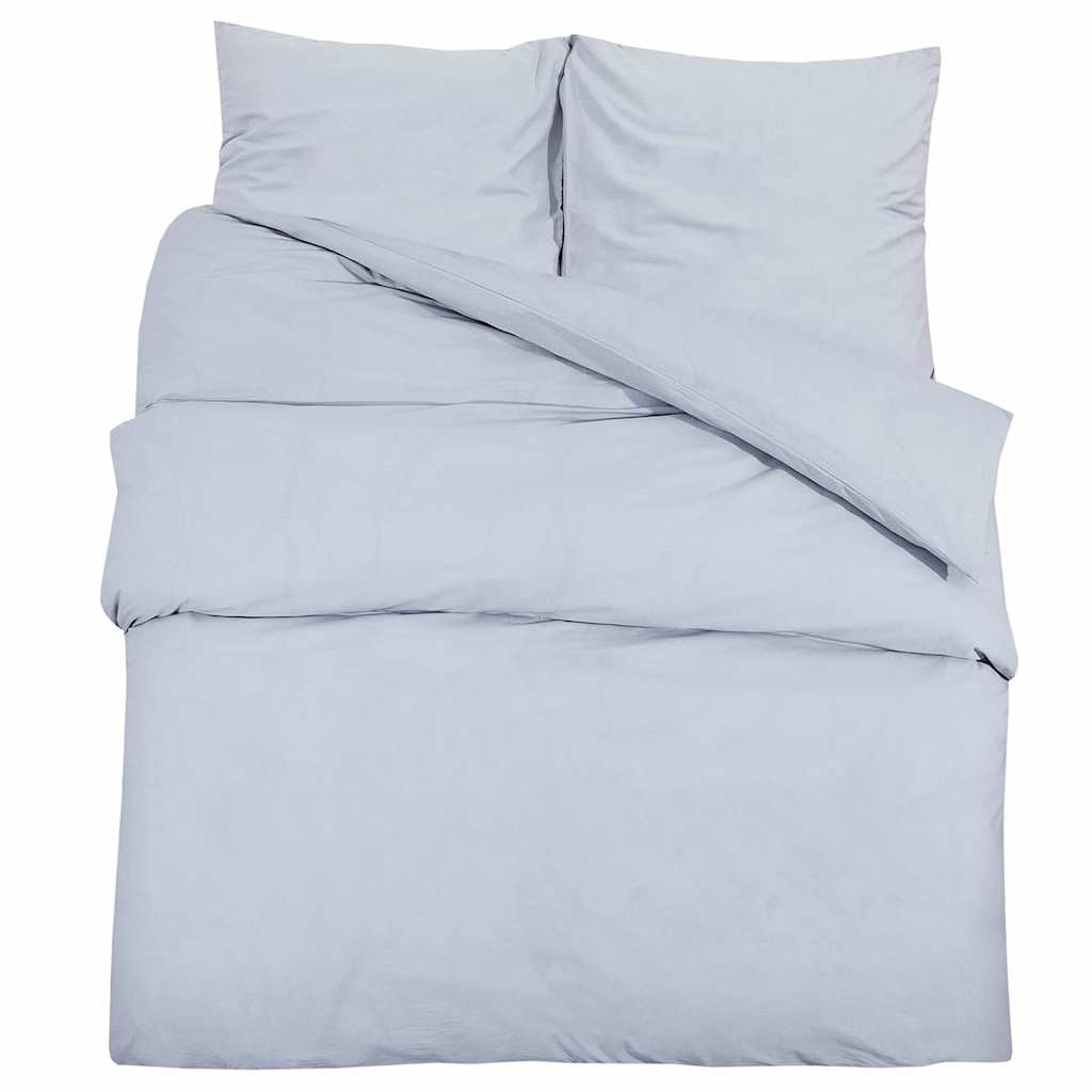 Housse de couette Lestona, coloris gris, sur un lit