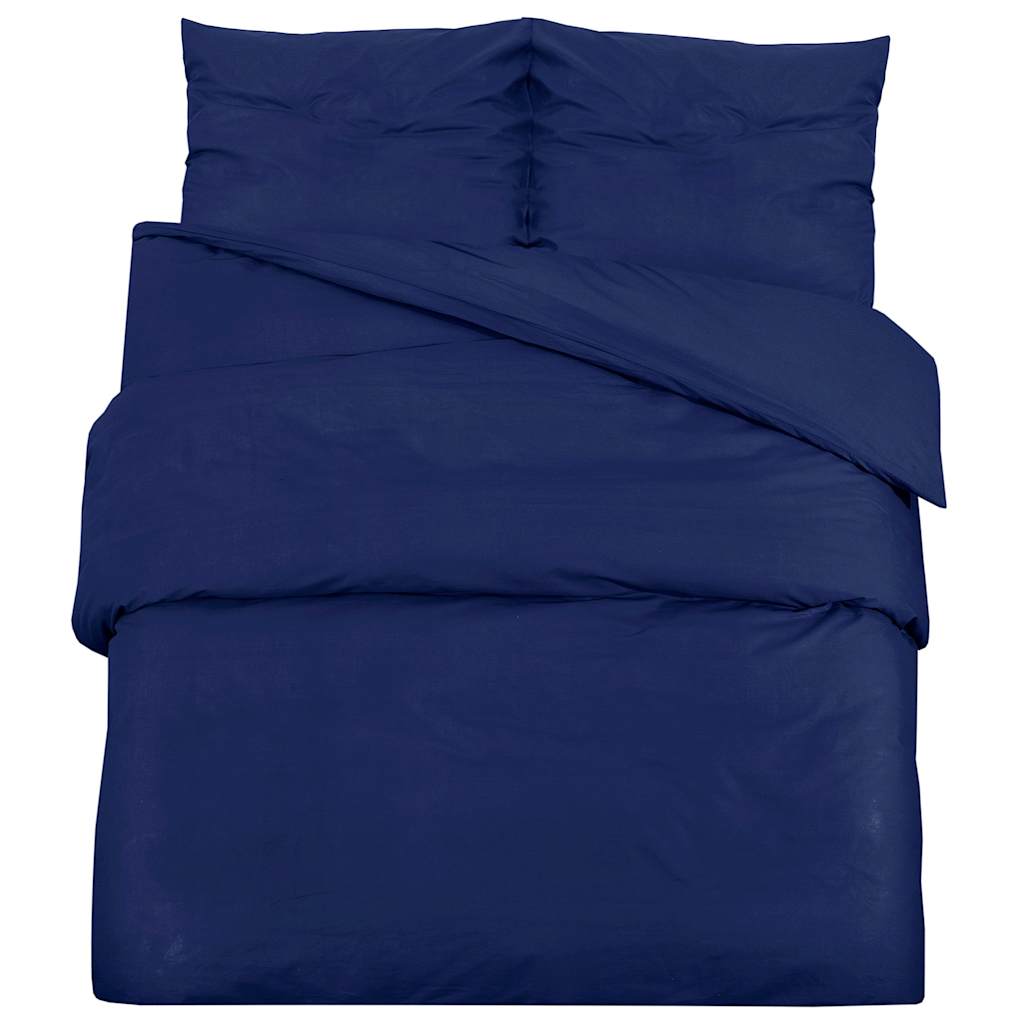 Housse de couette Lestona, coloris bleu marine, sur un lit