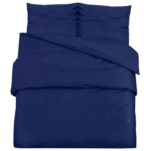 Housse de couette Lestona, coloris bleu marine, sur un lit