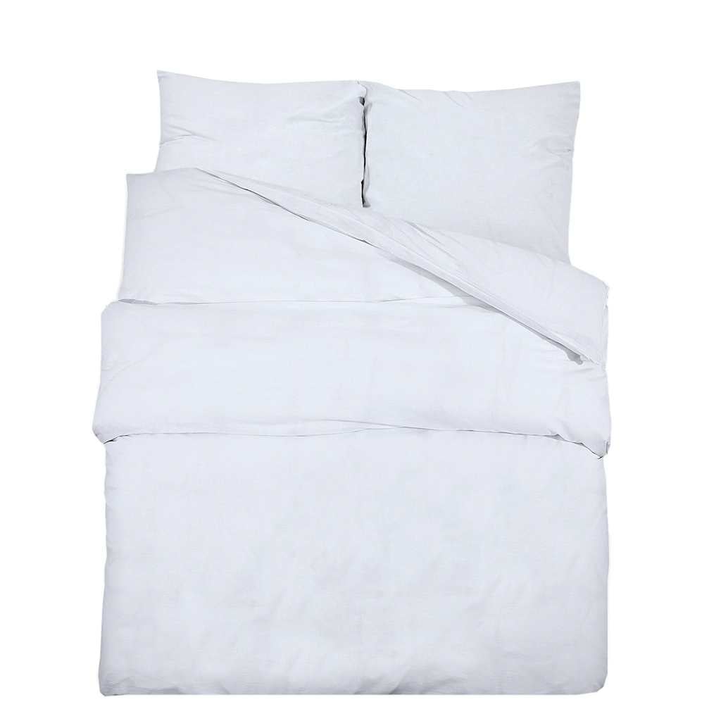 Housse de couette Lestona, coloris blanc, sur un lit