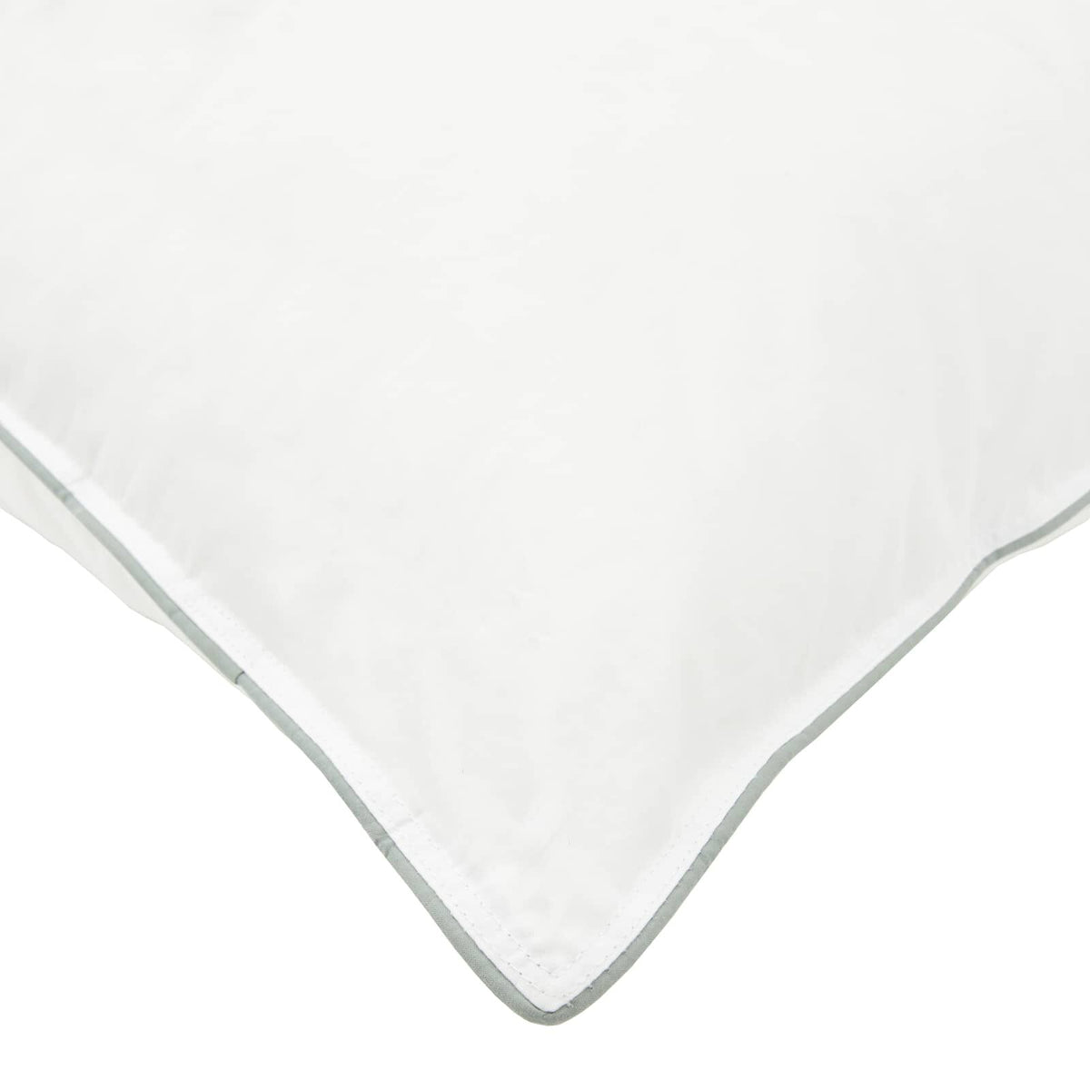 Détail du coin et du passepoil de l’oreiller